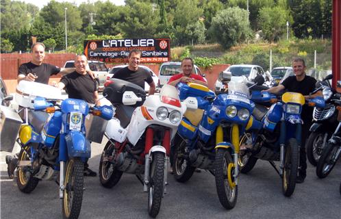 De gauche à doite : Michel Robert, Eric Bono et Didier Tarentino les responsables de AC motorbikes, et Daniel D'Ignoti.  