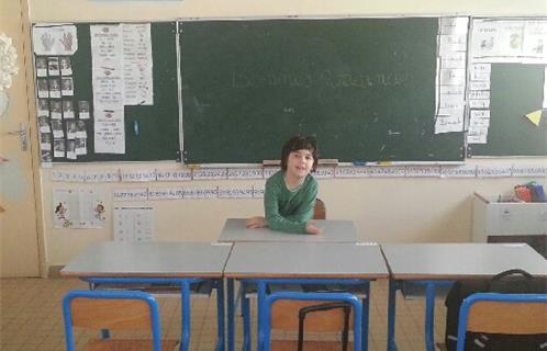 Brandon dans sa classe à Eugène Montagne (photo DR).