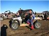 Jean-Paul au volant, Pascal debout à coté du buggy 